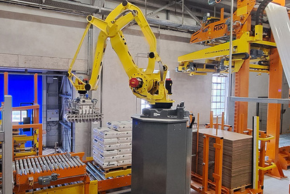 Système de houssage clés en main en fin de ligne pour des produits ensachés